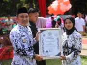 Budaya, Apresiasi, dan Pesan Moral Warnai Peringatan Hari Guru Nasional 2025 di Lampung Barat